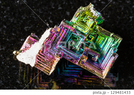 rough grown bismuth crystals mineral on black 129481433