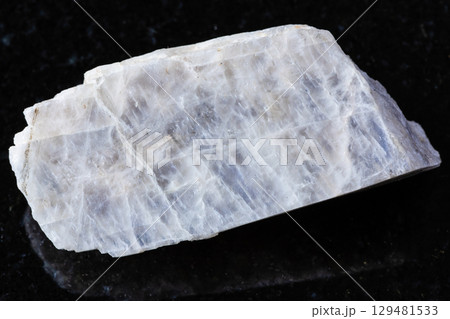 sample of raw belomorite moonstone rock on black 129481533