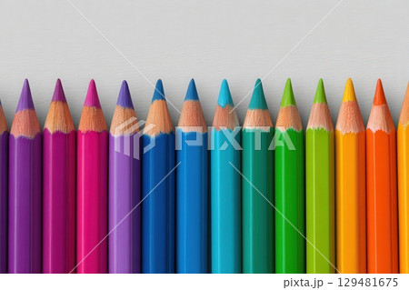 A collection of colorful pencils sits aligned on a neutral background, showcasing shades of purple, blue, green, and orange. Each pencil points upwards, ready for artistic creation. 129481675