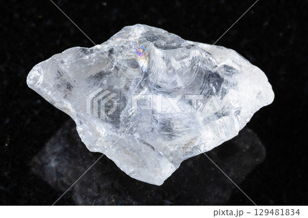sample of raw rock crystal mineral on black sample of raw rock crystal mineral on black 129481834
