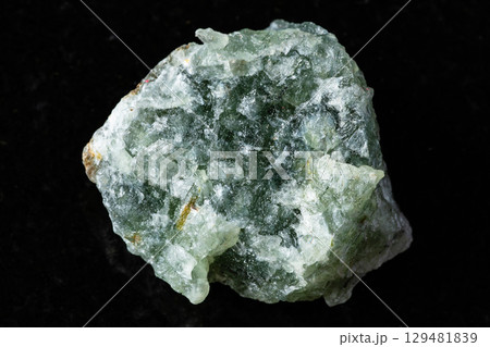 sample of uncut green aventurine rock on black sample of uncut green aventurine rock on black 129481839