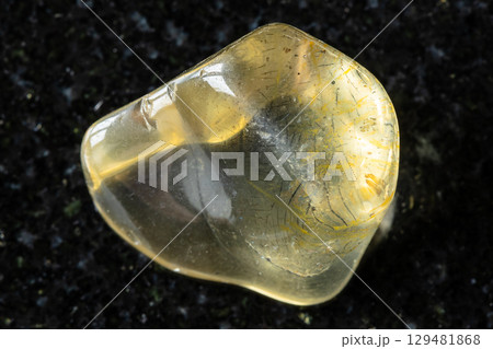 tumbled transparent orthoclase mineral on black tumbled transparent orthoclase mineral on black 129481868