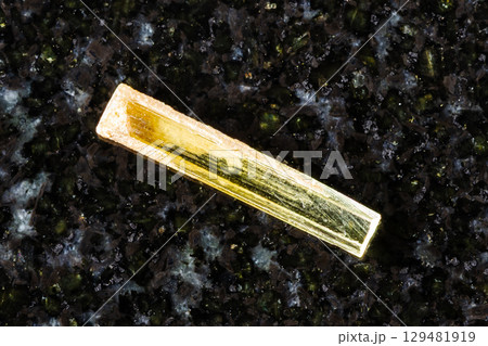 rough heliodor yellow beryl crystal on black rough heliodor yellow beryl crystal on black 129481919
