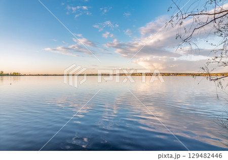 Blue lake with cloudy sky, natural background 129482446