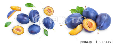 fresh plum and half with leaves isolated on white background. Top view. Flat lay 129483351