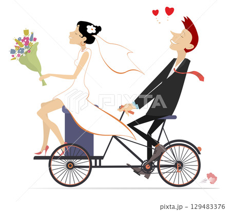 Happy married wedding couple rides a bicycle. Happy bridegroom and bride with a bunch of flowers in the hand ride a bicycle. Isolated on white background 129483376