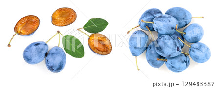 plums with leaf isolated on a white background. Top view. Flat lay pattern plums with leaf isolated on a white background. Top view. Flat lay pattern 129483387