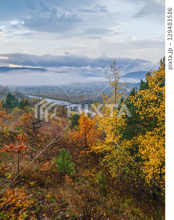 Morning fog on country foothills above Opir and Stryi rivers, and slopes of the Carpathian Mountains in far, Ukraine. 129483586