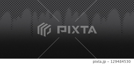 Abstract black background with textured halftone pattern, featuring a gradient effect that creates depth and visual interest, ideal for design projects and creative applications 129484530