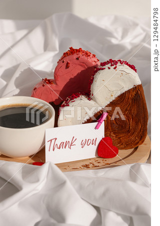 THANK you gratitude wishes saying caption on greeting card Coffee breakfast in rumpled bedding bed with heartshaped pastry croissant treat. Food experimentation viral dessert baking trend THANK you gratitude wishes saying caption on greeting card Coffee breakfast in rumpled bedding bed with heartshaped pastry croissant treat. Food experimentation viral dessert baking trend 129484798