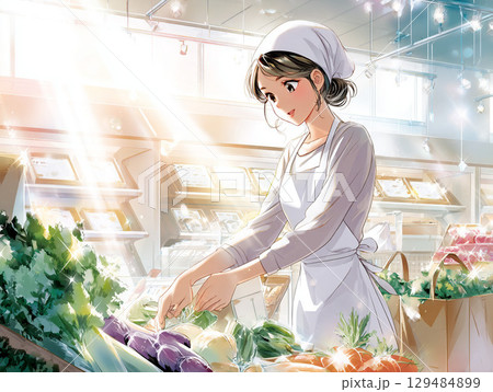 スーパーの青果売り場・女性店員・野菜陳列・制服 129484899