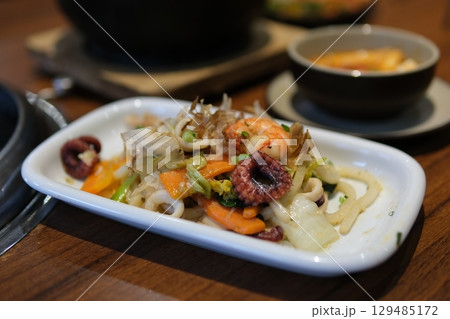 Sushi rice cheese Rice and prawns or paella, a meal with seafood and vegetables. Cooked rice with shrimp, asian or Spanish food 129485172