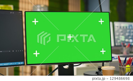 Empty startup office with green screen PC and artificial intelligence program running on monitors. Mockup computer display in AI industry startup workspace leveraging machine learning technology Empty startup office with green screen PC and artificial intelligence program running on monitors. Mockup computer display in AI industry startup workspace leveraging machine learning technology 129486698