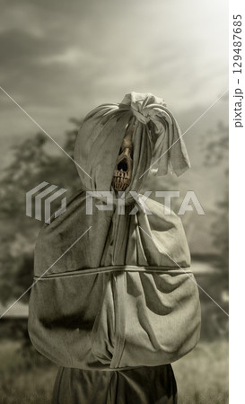 Pocong on the field at night. A traditional ghost from Indonesia that takes the form of a human wrapped in a shroud or winding sheet. Concept of Halloween Pocong on the field at night. A traditional ghost from Indonesia that takes the form of a human wrapped in a shroud or winding sheet. Concept of Halloween 129487685