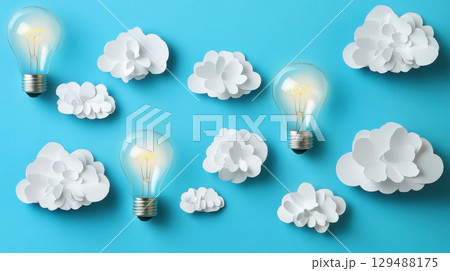 Light Bulbs and White Paper Clouds on Blue Background Design Light Bulbs and White Paper Clouds on Blue Background Design 129488175