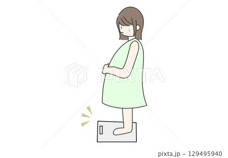 体重計に乗って予想以上に太っていて焦る妊婦 体重計に乗って予想以上に太っていて焦る妊婦 129495940