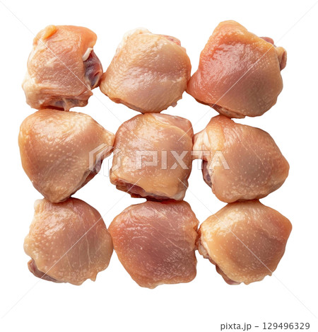 Raw boneless skin on chicken thighs arranged in grid pattern on transparency background 129496329