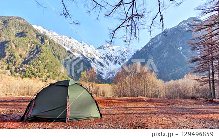 Natural landscape photo with green tent, trees, snow mountain in Nagoya Japan 129496859