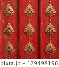Ornate Golden Floral Design on Vibrant Red Background, Perfect for Decorative Themes and Artistic Projects 129498196