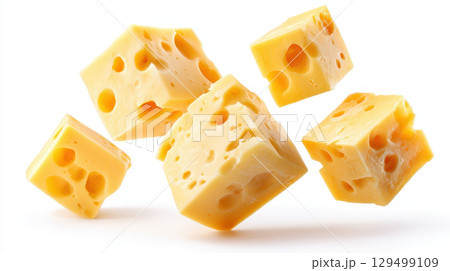 Cheese cubes with holes floating on white background showing fresh dairy food perfect for auto mechanic car repair vehicle maintenan snack or meal preparation in bright setting Cheese cubes with holes floating on white background showing fresh dairy food perfect for auto mechanic car repair vehicle maintenan snack or meal preparation in bright setting 129499109