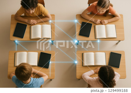 Digital learning in smart classroom uses educational technology to connect students with books and tablets enhancing interactive knowledge sharing and collaborative study experience 129499188