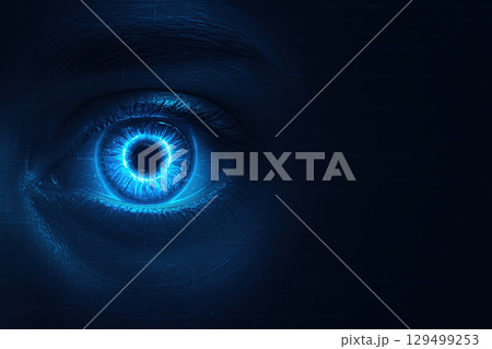 Medical eye close up with glowing blue iris and futuristic digital interface technology concept for healthcare and vision care innovation 129499253