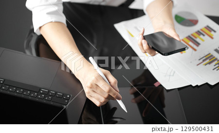 Business concept. A confident gesture by a female leader with leadership and innovative attitude. Business concept. A confident gesture by a female leader with leadership and innovative attitude. 129500431