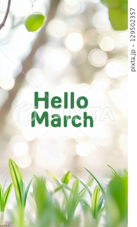 Hello march greeting with green leaves surrounding text on light background 129502357