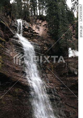 Waterfall in Jety-Oguz gorge, Kyrgyzstan. Tourist attraction, travel landmark 129503067
