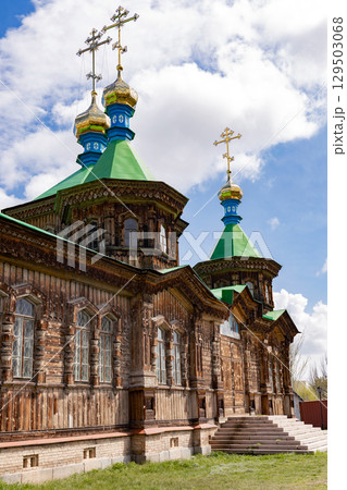 Old Christian church built of wood 129503068