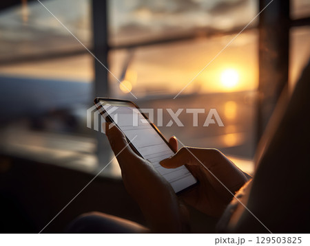 flight booking confirmation on phone screen 129503825
