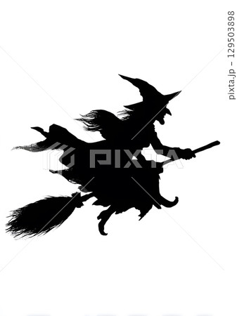 spooky silhouette of witch riding broomstick 129503898