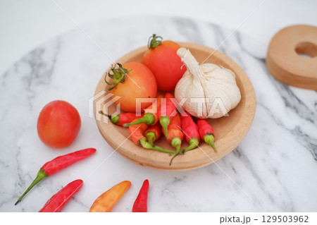 Cooking Ingredients with Red Chili, Garlic, and Tomato Cooking Ingredients with Red Chili, Garlic, and Tomato 129503962