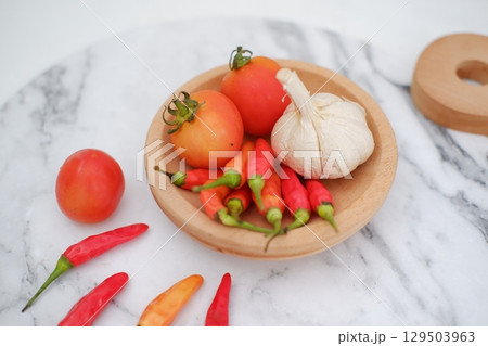 Cooking Ingredients with Red Chili, Garlic, and Tomato Cooking Ingredients with Red Chili, Garlic, and Tomato 129503963
