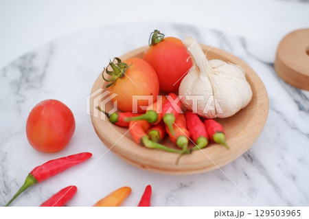 Cooking Ingredients with Red Chili, Garlic, and Tomato Cooking Ingredients with Red Chili, Garlic, and Tomato 129503965
