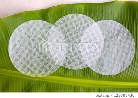 Stacked round sheets of Vietnamese rice paper 129505430