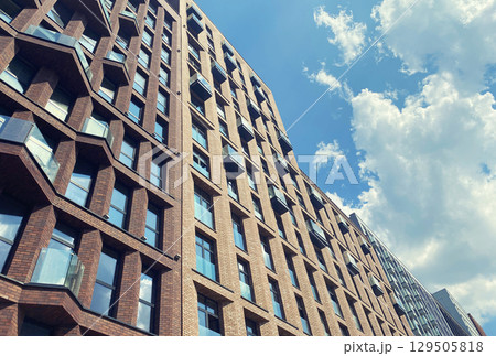 Architecture and real estate, modern residential apartment building with large panoramic windows 129505818