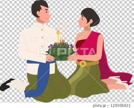 thai cultural festival scene with couple kneeling in traditional attire holding krathong for loy krathong celebration in thailand 129506921