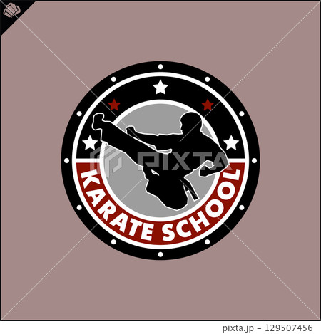 Karate high kick emblem martial art symbol design. Karate high kick emblem martial art symbol design. 129507456