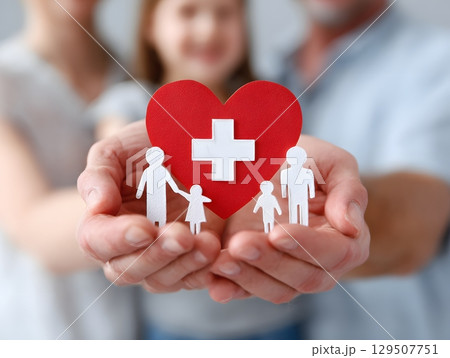 happy family holding heart symbol with cross health insurance concept happy family holding heart symbol with cross health insurance concept 129507751