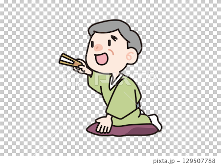 Rakugo performer pointing with a fan 129507788