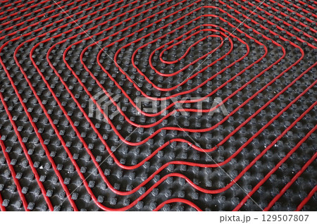Tubes of radiant underfloor heating installation 129507807