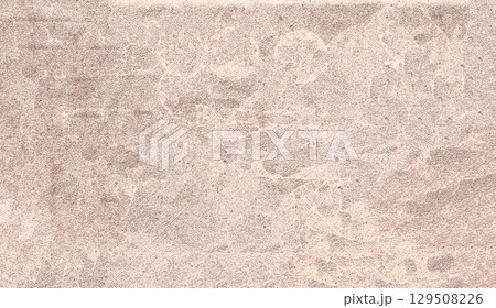 Beige grunge textured wall creating abstract background 129508226