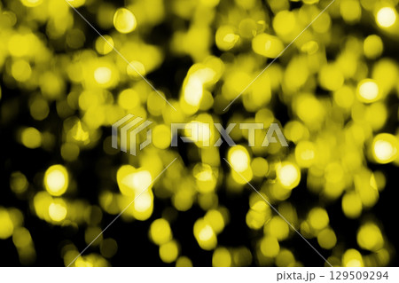 イエロー系キラキラ背景素材　(写真素材) 129509294