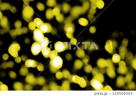イエロー系キラキラ背景素材　(写真素材) 129509303