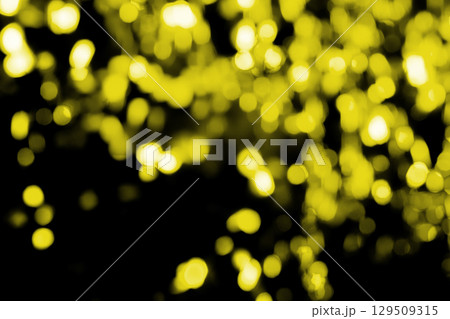 イエロー系キラキラ背景素材　(写真素材) 129509315
