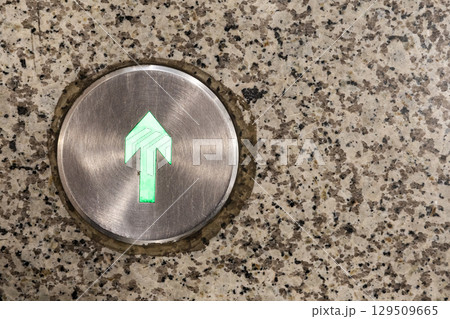 Indoor lighted directional arrow on floor pointing towards specific direction Indoor lighted directional arrow on floor pointing towards specific direction 129509665