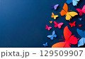 Beautiful paper cut butterflies on dark blue background 129509907