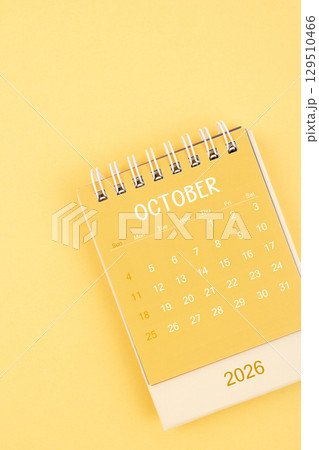 October 2026 Yellow desktop calendar on a yellow color background. October 2026 Yellow desktop calendar on a yellow color background. 129510466