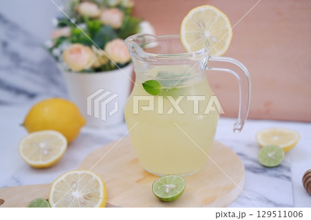Fresh Lemonade in Glass Pitcher with Mint 129511006